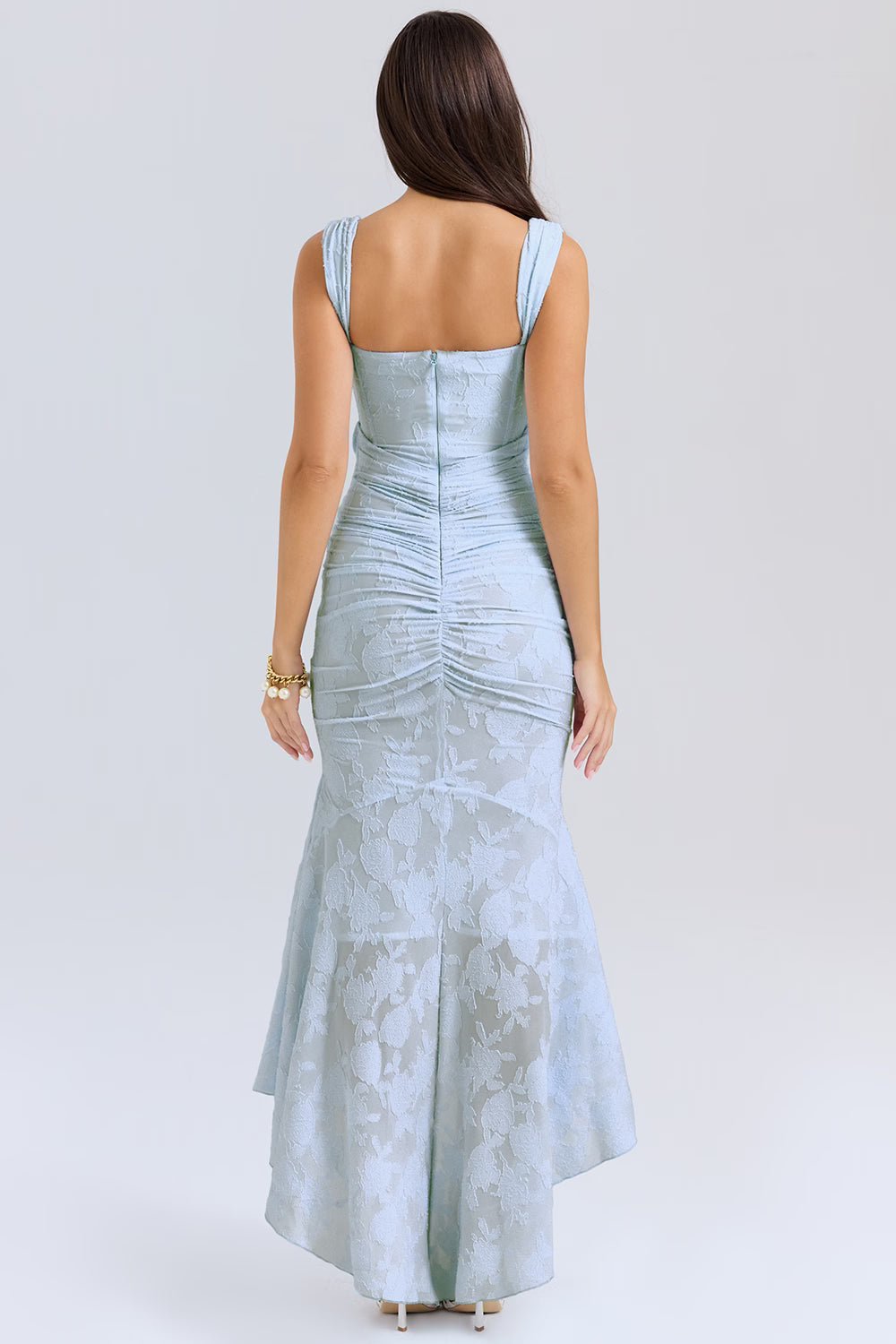 Back view of light blue corset midi dress with straight back neckline, center zipper and flared hem