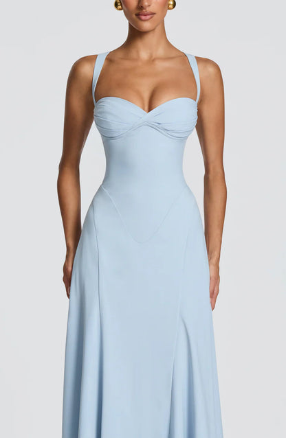 Close-up of light blue corset maxi dress showing ruched sweetheart bust, seamed bodice, and straps