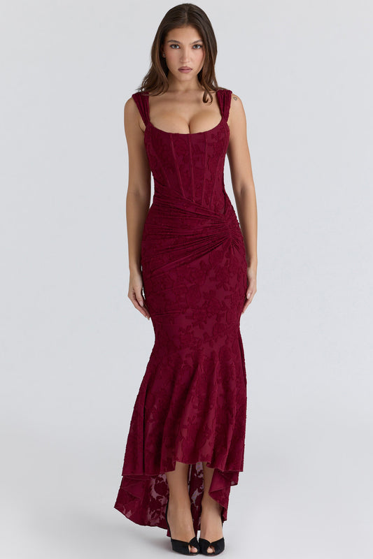 Front view burgundy corset midi dress with sweetheart neckline, ruched waist, high-low hem