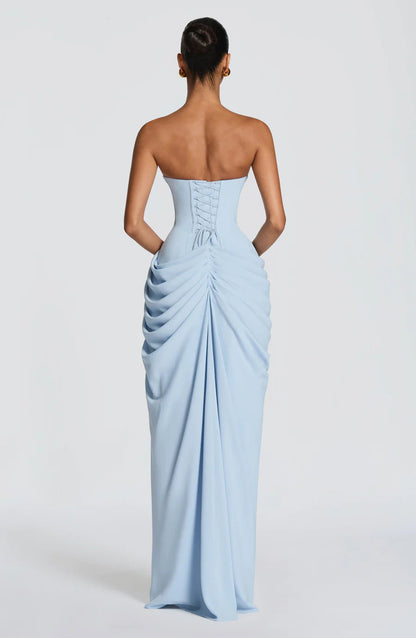 Back view light blue strapless maxi dress showing corset lace-up back and gathered ruching