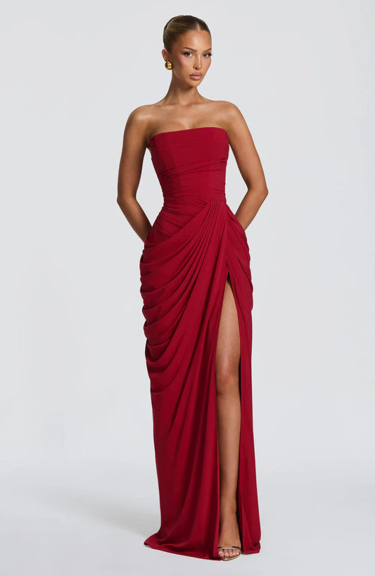 Red strapless ruched maxi dress with draped skirt and thigh-high slit, front full-length view