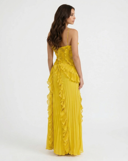 Back view yellow ruffle maxi dress with spaghetti straps, zip back bodice and pleated full-length skirt