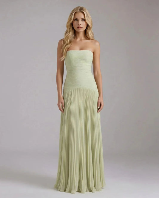 Sage green strapless maxi dress with ruched bodice and pleated chiffon skirt, front view