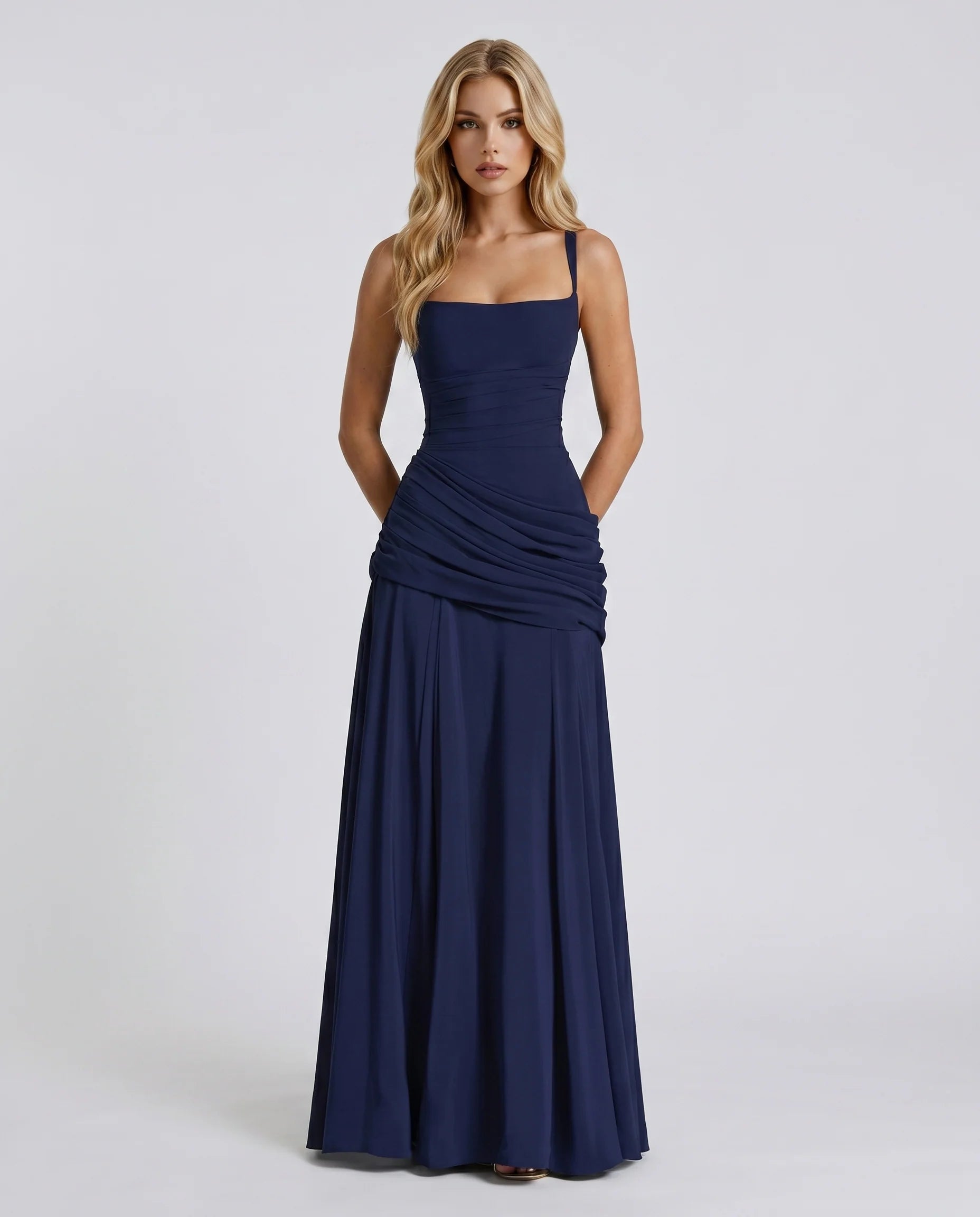 Navy ruched maxi dress with square neckline and spaghetti straps, full-length front view