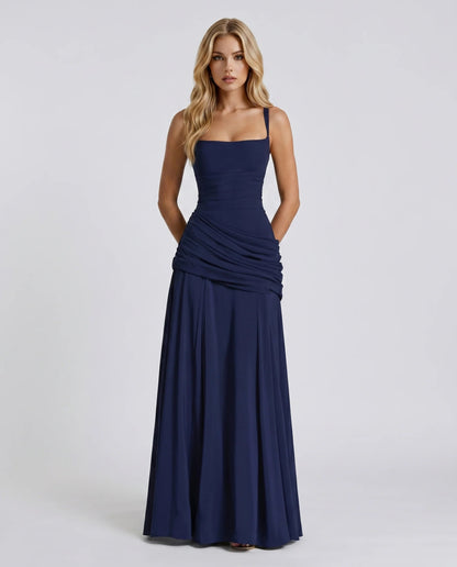Navy ruched maxi dress with square neckline and spaghetti straps, full-length front view