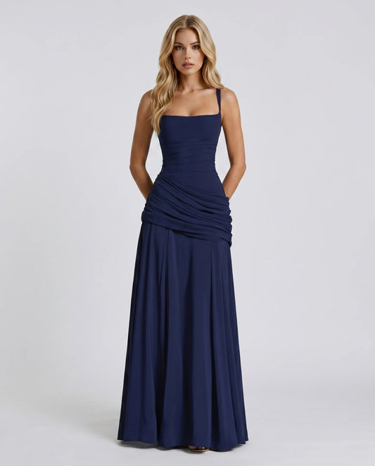 Navy ruched maxi dress with square neckline and spaghetti straps, full-length front view
