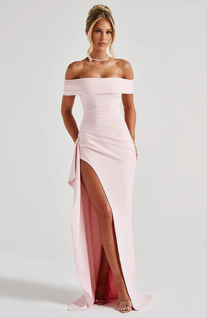 Light pink off shoulder ruched maxi dress with thigh high slit and draped side panel