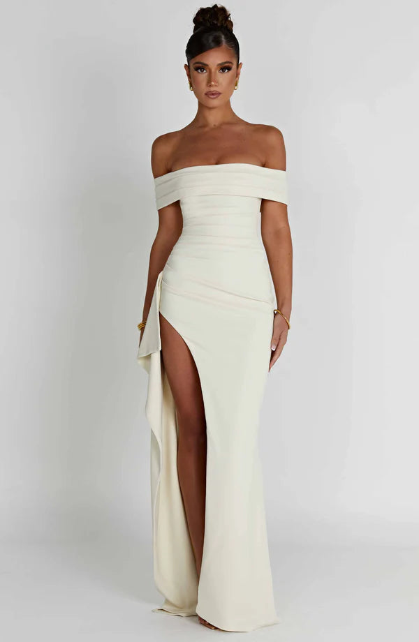 White off-shoulder ruched maxi dress with thigh-high slit and draped side panel, front view