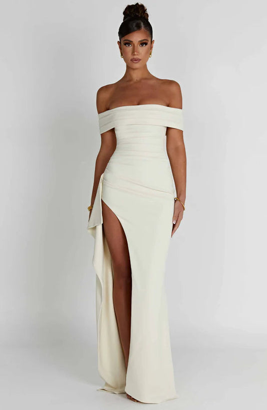 White off-shoulder ruched maxi dress with thigh-high slit and draped side panel, front view