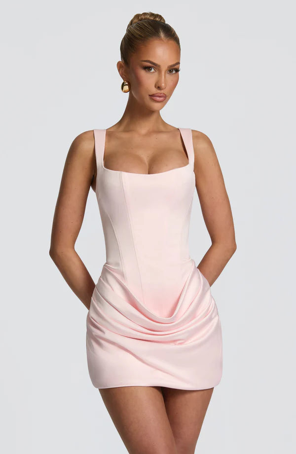 Light pink corset mini dress with square neckline and draped skirt, front view