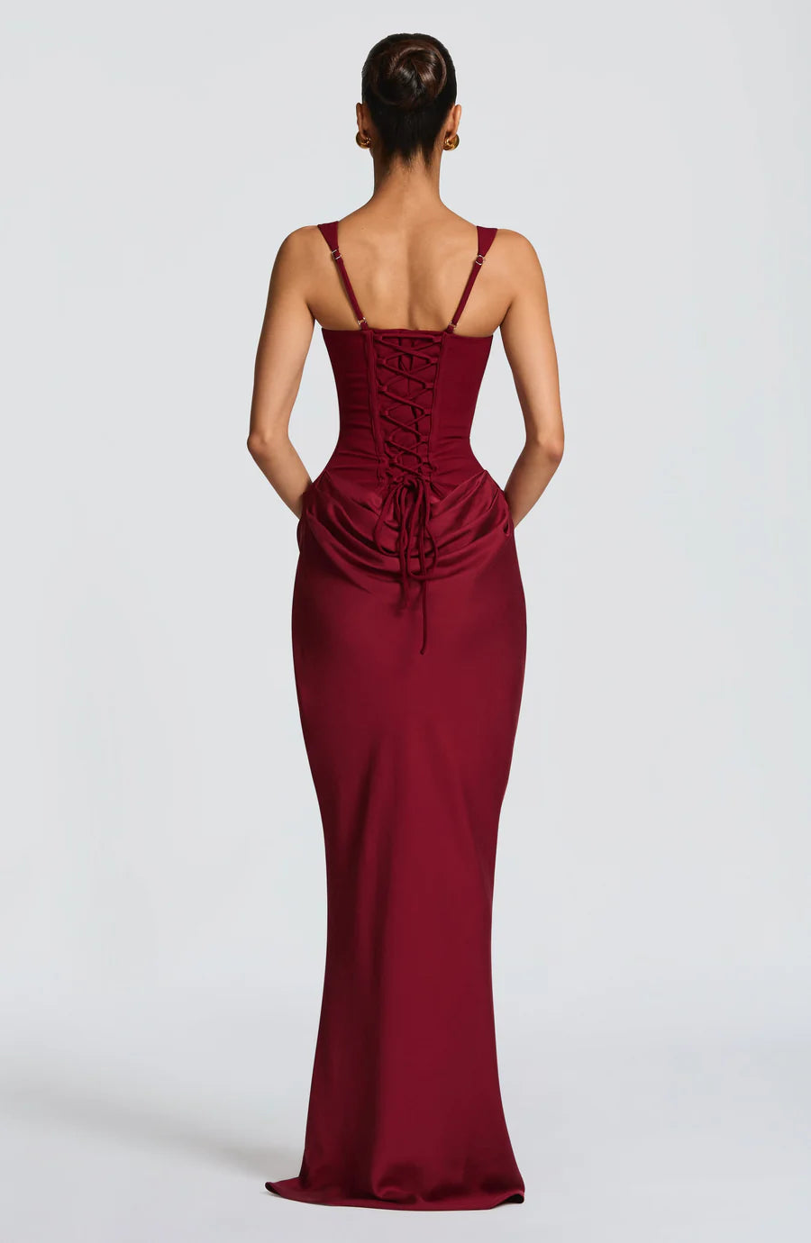 Back view burgundy maxi dress with adjustable straps and lace-up corset back detail