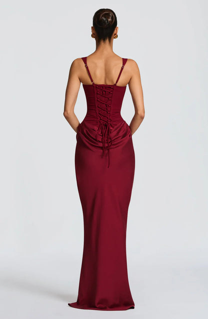 Back view burgundy maxi dress with adjustable straps and lace-up corset back detail