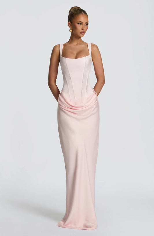 Front full-length blush pink draped maxi dress with square neckline and fitted corset bodice