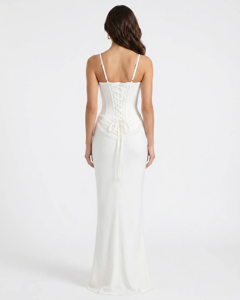 Back view of white maxi dress with lace-up corset back and adjustable straps, floor-length hem